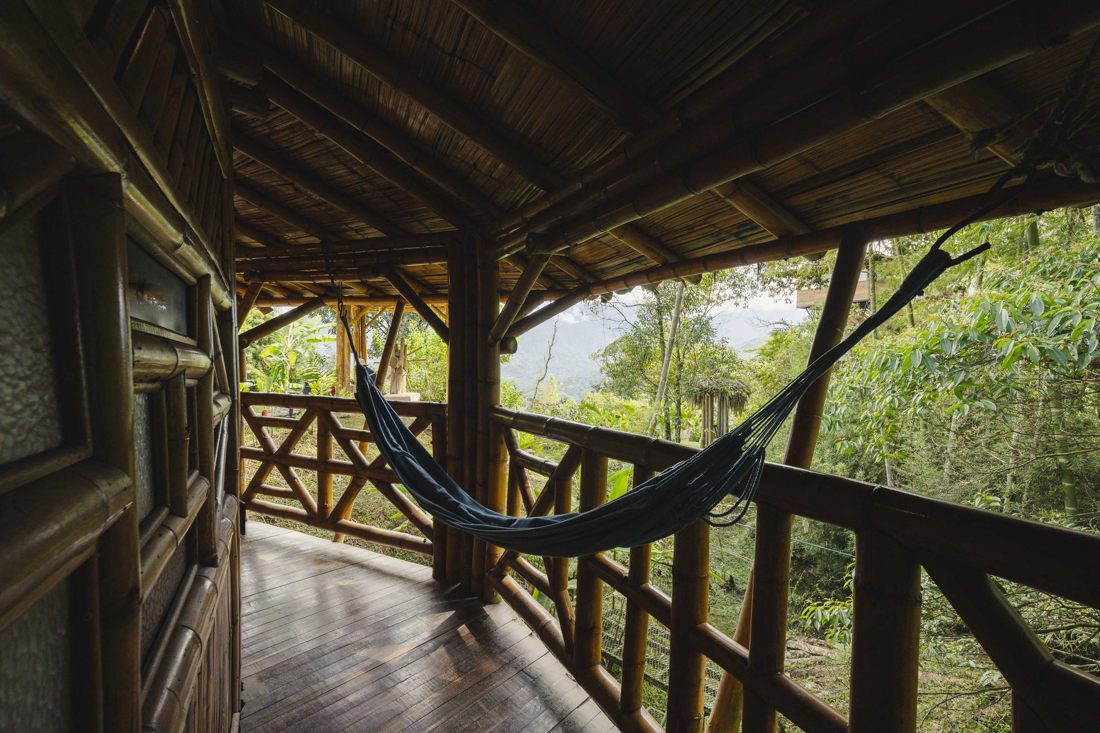 Hammock on a bamboo terrace overlooking the Antioquia mountains
